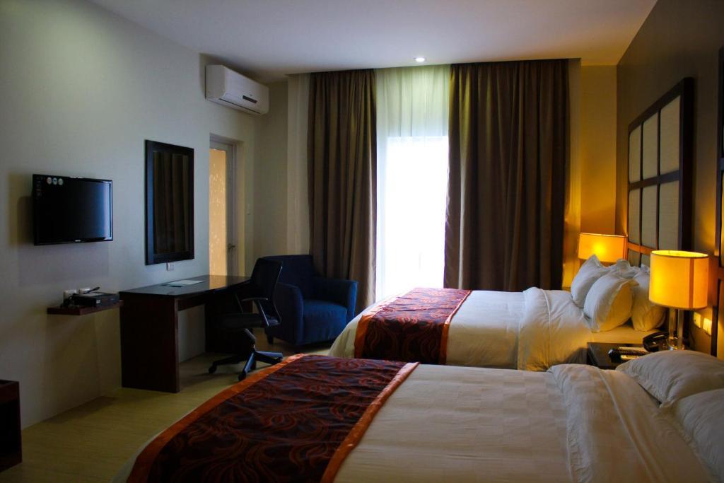 Avenue Suites Hotel And Spa Bacolod Habitación foto