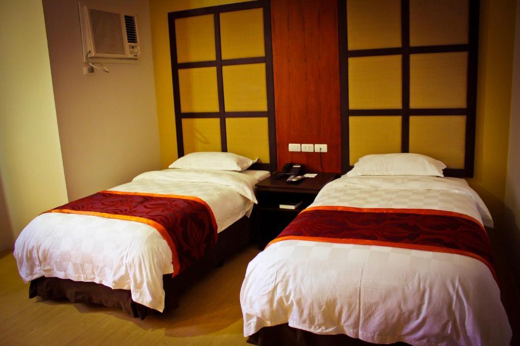 Avenue Suites Hotel And Spa Bacolod Habitación foto